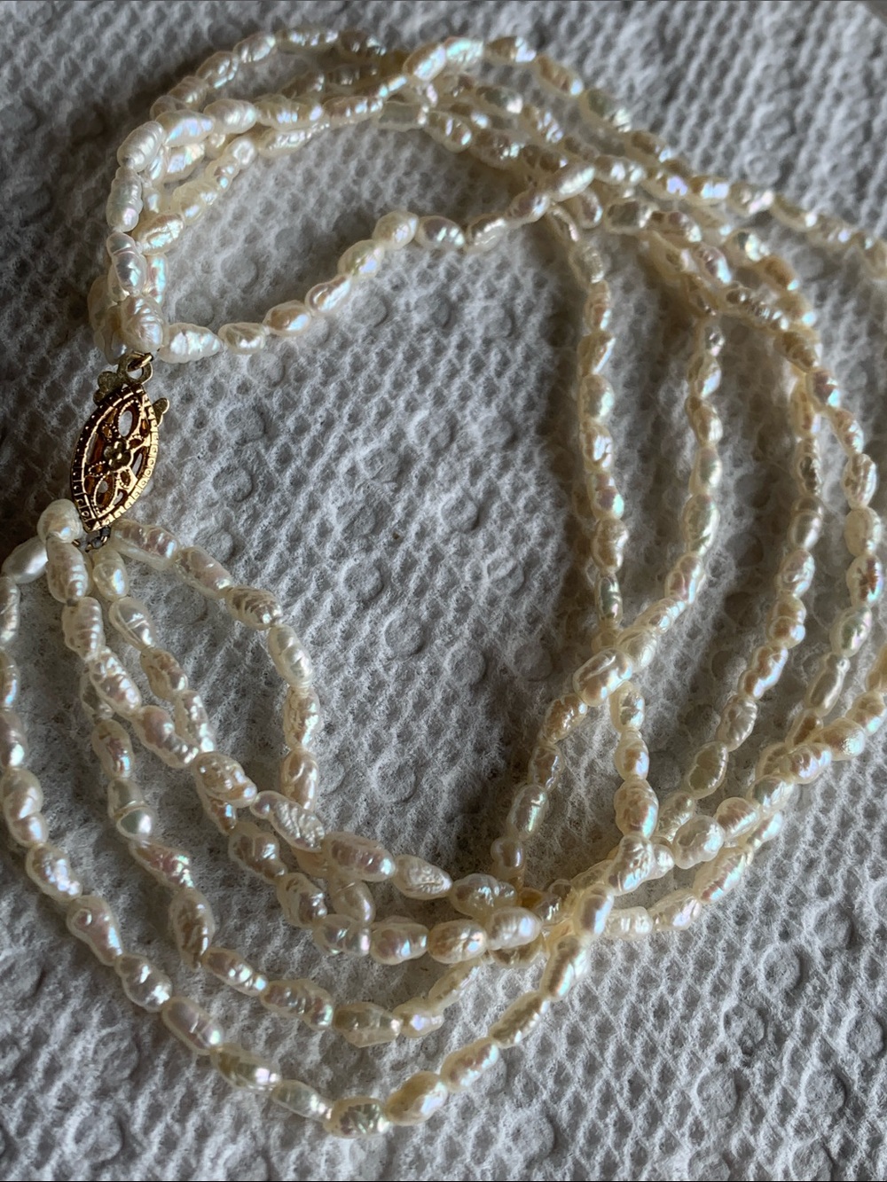Freshwater pearl bracelet with 14k gold clasp marked.